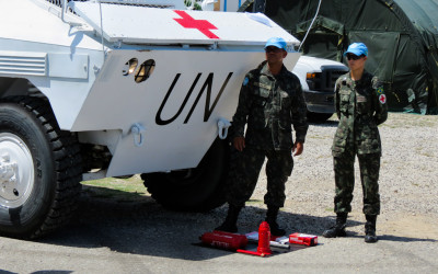 Military woman in a training with tank and armaments in UN Mission, Port-Au-Prince, Haiti, 2012.