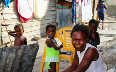 Washerwoman and homemaker in Cite Soleil, Port-Au-Prince, Haiti, 2012.