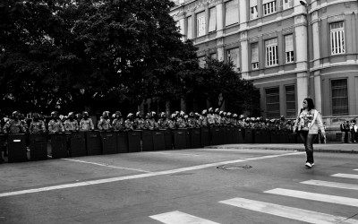 Police  barrier to contain protesters. frightened residents in central region, Belo Horizonte, Brazil, 2014.