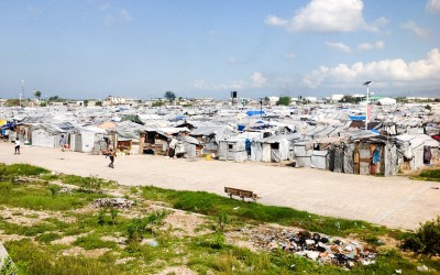 Displaced Camp Parc Jean Marie Vincent.  Residents of camps like this live with fear and terror, especially women, who are often victims of rape or threats. Port-au-Prince, Haiti, 2012.