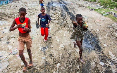 In many areas of Port-Au-Pince, children wait the whole day for food or some aid, Haiti, 2012.