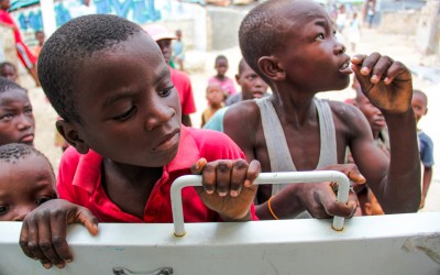 In many areas of Port-Au-Pince, children wait the whole day for aid, Haiti, 2012.