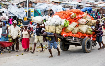 Known as one of the largest open-air markets, Hells Kitchen is known for its odor due to the immense variety of products on sale ranging from animals, food, clothing and even garbage. But also as a workplace for hundreds of people who walk miles to get a chance to raise some money. Port-Au-Prince, Haiti, 2012.