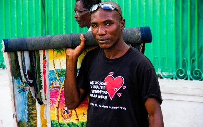 Trader and expositor in Local Craft Market organized by UN Tt encourage local commerce and culture. Port-Au-Prince, Haiti, 2012.