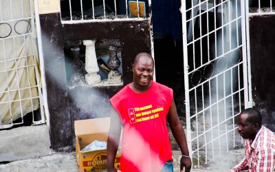 Even in the face of chaos, violence, hunger and poverty, Haitians do not lose their smiles and the desire to change the situation of the country. Cité Soleil, Port-Au-Prince, Haiti, 2012.