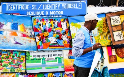 Trader and expositor in Local Craft Market organized by UN Tt encourage local commerce and culture. Port-Au-Prince, Haiti, 2012.