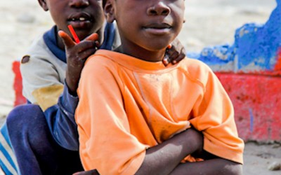 Two years after the earthquake that destroyed the country and made thousands dead, including parents and mothers, orphans rely on their brothers and in the families of friendly friends to continue their lives and recreate routines. Port-au-Prince, Haiti, 2012.