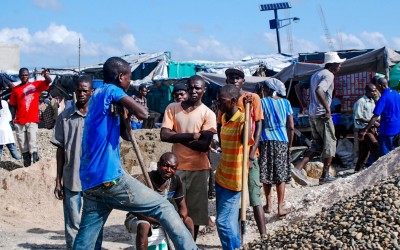 Even men, who in Haitian culture do not have the habit of working as much as women, also contribute in the contructions to help support their families and buy a house, lost with the earthquake. Port-au-Prince, Haiti, 2012.