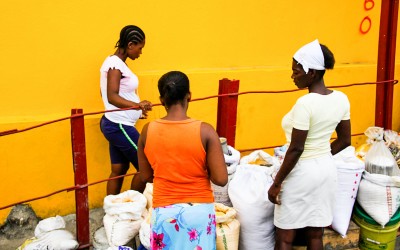 Women sale in the market. Responsible for the majority of the time for family support, Haitian women do double and triple working hours in addition to taking care of their children, the house and, at various times, are still threatened and raped by their husbands or partners. Port-Au-Prince, Haiti, 2012.