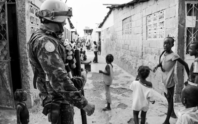 Peacekeeper in mission in Cité Soleil, one of the most dangerous region, before the project “Clean Quarter”, Port-Au-Prince, Haiti, 2012.