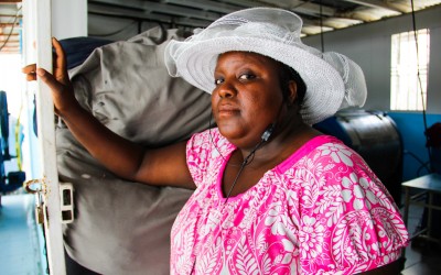 Washerwoman  in former military Brabatt I by UN Mission, Port-Au-Prince, Haiti, 2012.