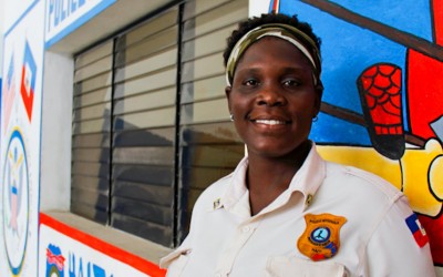 Police Officer in the dangerous region Cité Soleil, Port-Au-Prince, Haiti, 2012.