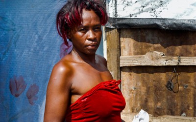 Hairdresser in Jean Marie Displaced Camp, Port-Au-Prince, Haiti, 2012.