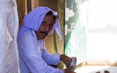 Muslim man in Cover II Refugee Camp, Iraq (Iraqi Kurdistan). In the region, and now in the camps, civilians are tolerant of one another in relation to religion. Muslim families, Yazidis and Catholics live with respect and compassion.