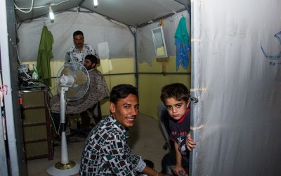 Hair salon in Sharia Refugee Camp. This salon is the only one to attend to all the families - about 9.000 - who live in the camp. Near Duhok, Iraq (Iraqi Kurdistan).