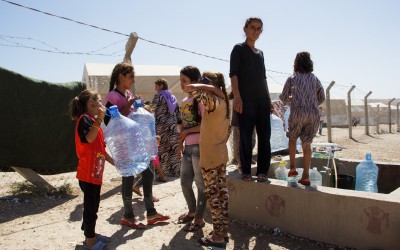 In large refugee camps, such as the Sharia Refugee Camp, another recurring problem is the shortage of water and the difficulty residents have in transporting it to the tents, Duhok, Iraq (Iraqi Kurdistan).