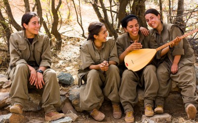 During a break from combat training, young girls of the Kurdish Worker’s Party (PKK) sing Kurdish traditional songs. Considered as a terrorist group by the North Atlantic Treaty Organization (NATO), the PKK is seen by the Kurds as an ally on the fight for the independence of Kurdistan and against the violence of Islamic State (ISIS). Furthermore, the PKK strives to ratify the cultural, economical and political rights, and promotes the empowerment of women in the Middle East. Qandil mountains, Iraq (Iraqi Kurdistan), 2015.
