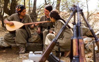 During a break from combat training, young girls of the Kurdish Worker’s Party (PKK) sing Kurdish traditional songs. Considered as a terrorist group by the North Atlantic Treaty Organization (NATO), the PKK is seen by the Kurds as an ally on the fight for the independence of Kurdistan and against the violence of Islamic State (ISIS). Furthermore, the PKK strives to ratify the cultural, economical and political rights, and promotes the empowerment of women in the Middle East. Qandil mountains, Iraq (Iraqi Kurdistan), 2015.