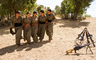 The Kurdish Worker’s Party (PKK) guerrillas sing and dance typical traditional Kurdish songs. This is a rare outdoor moment, since due to the attacks by ISIS and NATO (promoted by the Turkish government), the PKK’s work is restricted to the underground caves which are able to hold dozens of fighters and livelihood resources up to 6 months. Qandil mountains, Iraq (Iraqi Kurdistan), 2015.-56