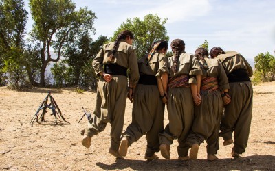 The Kurdish Worker’s Party (PKK) guerrillas sing and dance typical traditional Kurdish songs. This is a rare outdoor moment, since due to the attacks by ISIS and NATO (promoted by the Turkish government), the PKK’s work is restricted to the underground caves which are able to hold dozens of fighters and livelihood resources up to 6 months. Qandil mountains, Iraq (Iraqi Kurdistan), 2015.