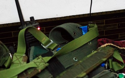Vest of one of the international peshmergas. Known by the name of Rebaz, it takes, besides the radio of communication, a notebook and a pen in which describes its days in form of book for the son. Iraq (Iraqi Kurdistan), Middle East, 2015.