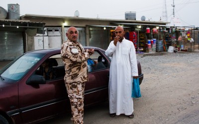 Peshmerga and civilian resident of a community closely to one of the frontlines. Collaboration of civilians to devise new military combat strategies is important. Once the community supports the peshmergas, the isis loses part of its power of persuasion. Iraq (Iraqi Kurdistan), Middle East, 2015.