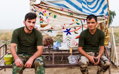 Young peshmergas waiting to enter the next shift. Even though Kurdistan often does not have the conditions to pay soldiers, they work and are dedicated to protecting communities against the Islamic State (ISIS). Iraq (Iraqi Kurdistan), Middle East, 2015.