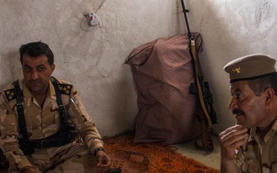 Commanders of the Peshmergas discussing new strategies against the Islamic State (ISIS). Also known as Daesh, extremists are increasingly violent and desperate to gain more space. Iraq (Iraqi Kurdistan), Middle East, 2015.