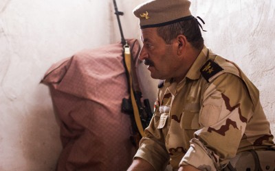 Commanders of the Peshmergas discussing new strategies against the Islamic State (ISIS). Also known as Daesh, extremists are increasingly violent and desperate to gain more space. Iraq (Iraqi Kurdistan), Middle East, 2015.