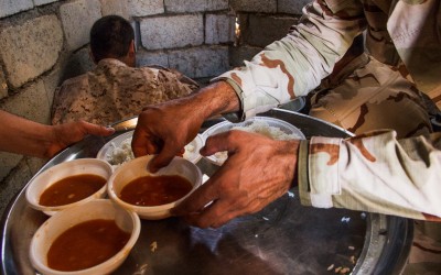 Daily food of the peshmergas on the bases that are not from the current ruling party, the Kurdistan Democratic Party (KDP). Iraq (Iraqi Kurdistan), Middle East, 2015.