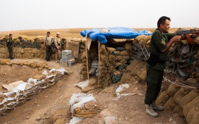 Wearing improper clothes and protection, a Peshmerga soldier combats the Islamic State (ISIS). The Kurdish government struggles, as it strongly depends on funds from Bagdad, Iraq’s capital. In turn, most of the times the Peshmergas have to subside for clothes and equipment on their own, near Mosul, Iraq (Iraq Kurdistan).
